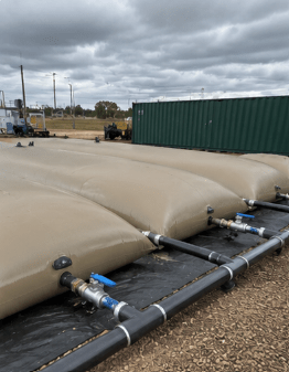 Modular PVC water bladder system allowing individual tanks to be isolated for maintenance or operation.