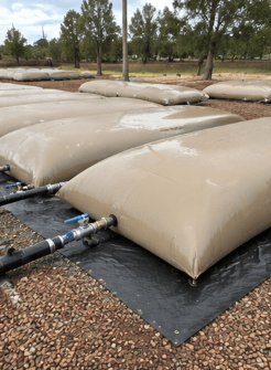 Expandable modular PVC water bladder system allowing additional storage capacity to be added in the future.